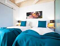 A Casa do Ouvidor auf Pico, gemütliches Doppelzimmer mit modernen Akzenten und entspannendem Ambiente.