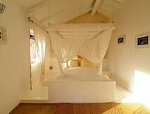 Spinguera Ecolodge auf Boa Vista, lichtdurchflutetes, gemütliches Zimmer mit Moskitonetz, minimalistischem Design