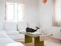 Spinguera Ecolodge auf Boa Vista, stilvoll eingerichtetes Wohnzimmer mit hellem, luftigem Ambiente und maritimen Akzenten