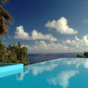 Pool mit Meerblick im Estalagem Ponta do Sol