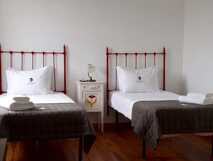 Adegas do Pico auf der Insel Pico – Gemütliches und stilvolles Schlafzimmer mit zwei Einzelbetten.