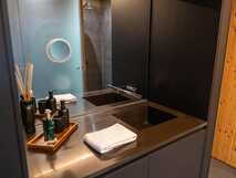 Landscape Furnas Boutique Hotel – Modernes, stilvolles Badezimmer mit elegantem Design und hochwertigen Details auf São Miguel.