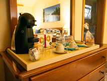 Residencial Aquamarina, gemütliche Kaffeestation mit frischen Snacks und Getränken für einen entspannten Start in den Tag.