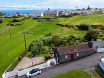 Tradicampo - Casa da Fonte auf Sao Miguel, idyllisches Landhaus mit grünen Gärten und Meeresblick, ideal für erholsame Natururlaube.