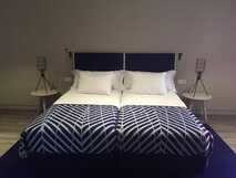 Casa Hintze Ribeiro Aparthotel auf Sao Miguel – Modernes, komfortables Zimmer mit stilvollem Design für erholsame Nächte.