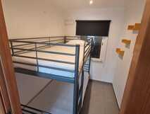 Santa Cruz Villas auf Flores, Schlafzimmer mit Etagenbett.