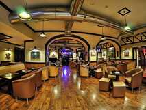 Talisman Hotel Sao Miguel – Gemütliche Lounge mit stilvollem Ambiente und maritimem Flair zum Entspannen.