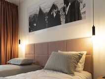 Aparthotel Horta Bay – modernes, gemütliches Zimmer mit stilvoller Beleuchtung und ansprechender Dekoration für entspannte Aufenthalte.