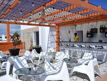 Hotel Ouril Agueda auf Boa Vista, Outdoor-Bar mit modernem Design und entspannter Atmosphäre für unvergessliche Urlaubsmomente.