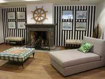 Vinha D´Areia Beach Hotel auf Sao Miguel, gemütlicher Lounge-Bereich mit stilvollem maritimem Dekor für entspannte Urlaubsstimmung.