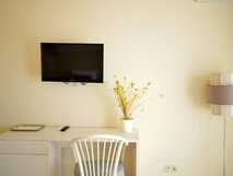 Hotel Ouril Agueda auf Boa Vista, hell eingerichtetes Zimmer mit modernem TV