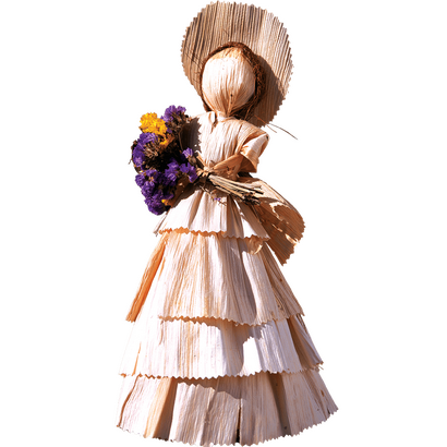 Traditionelle handgefertigte Maisstrohpuppe mit Blumen – entdecken Sie authentische Kulturerlebnisse mit picotours.