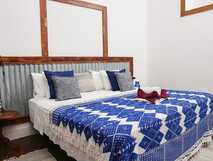 Casa Colonial König auf Fogo, gemütliches Zimmer mit traditionellem Dekor – perfekt zum Entspannen.