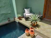 Casa Colonial König auf Fogo, stilvoller, kleiner Patio mit Pool für erholsame Stunden.